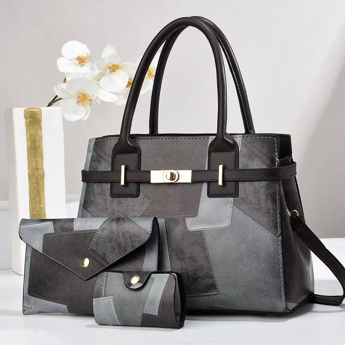 Three-piece handbag set: spacious, natural leather, perfect for everyday travel.