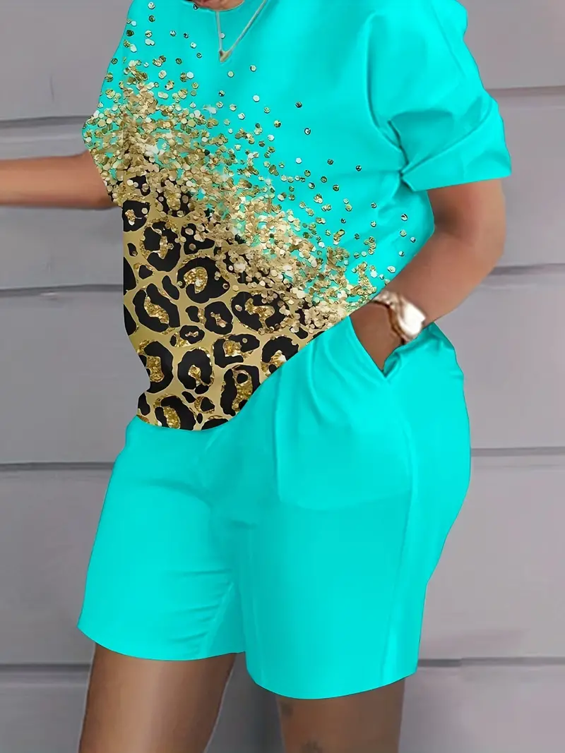 Conjunto casual de duas peças com estampa de letras laranja, gola redonda, manga curta