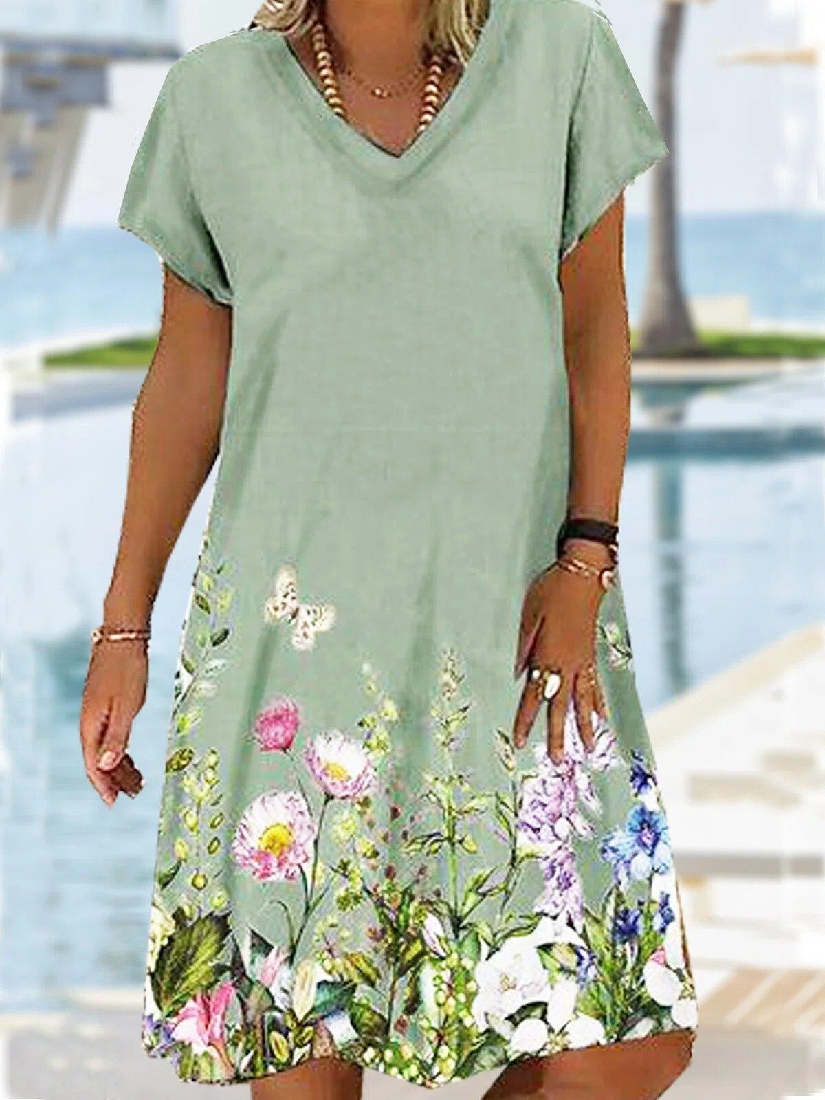 Prázdninové volné pletené šaty midi s krátkým rukávem a květinovým potiskem