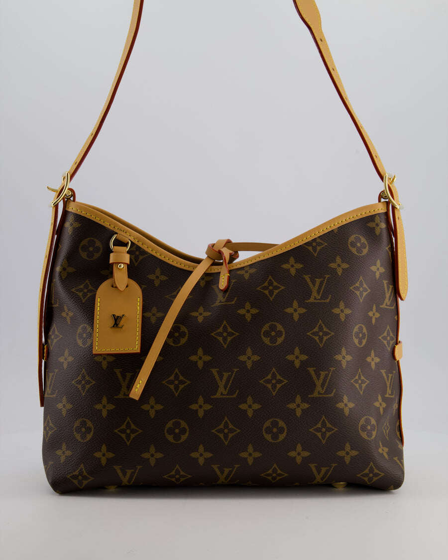 LOUIS VUITTON BROWN CARRYALL PM BAG IN MONOGRAM COATED CANVAS, VACCHETTA LEATHER AND GOLD HARDWARE