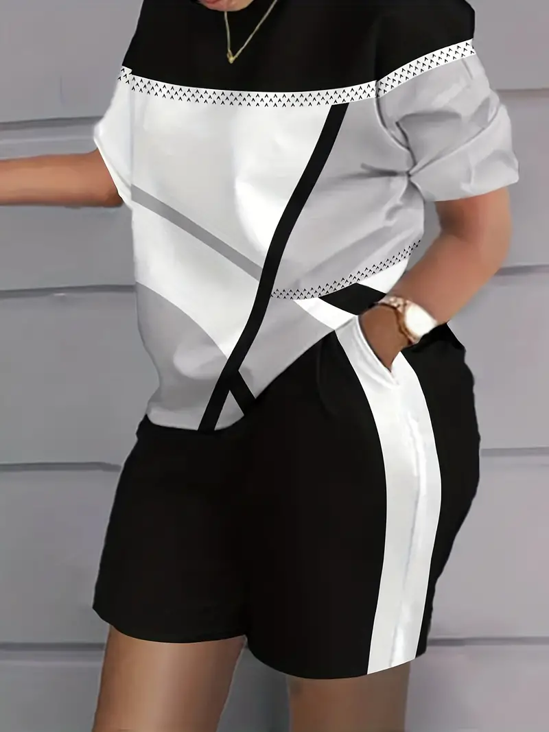 Conjunto casual de duas peças com estampa de letras laranja, gola redonda, manga curta