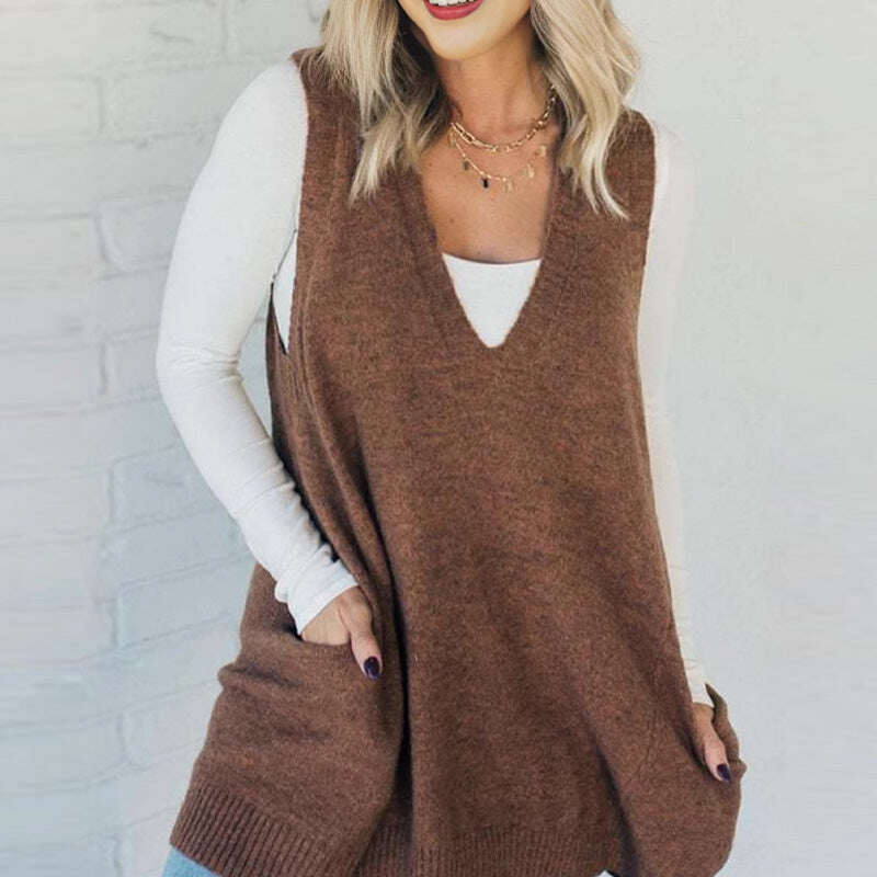 Colete feminino solto de gola alta com bolsos