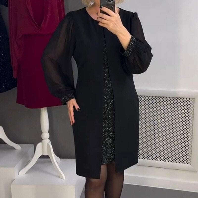Czarna sukienka midi z ozdobą z kamieni szlachetnych