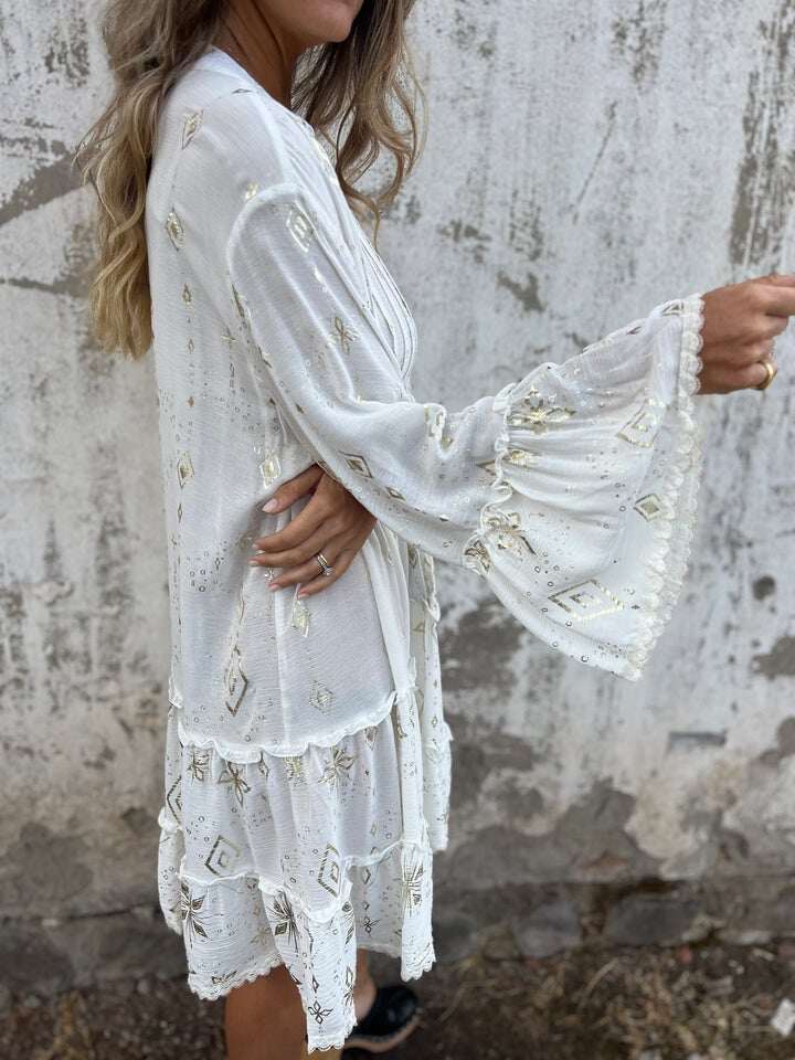 Venda imperdível 🔥 Vestido confortável com estampa elástica e decote em V