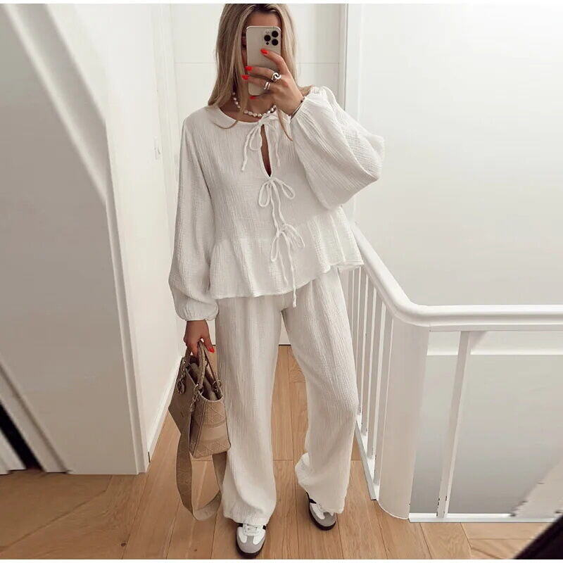 Conjunto de calças soltas de renda de moda casual, terno de calças com decote em O, camisa de cintura alta