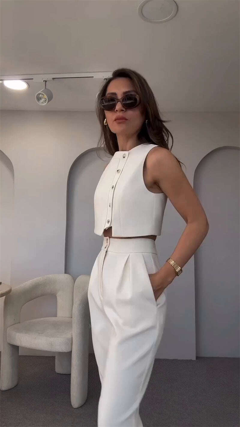 Conjunto de duas peças com top e calça com zíper