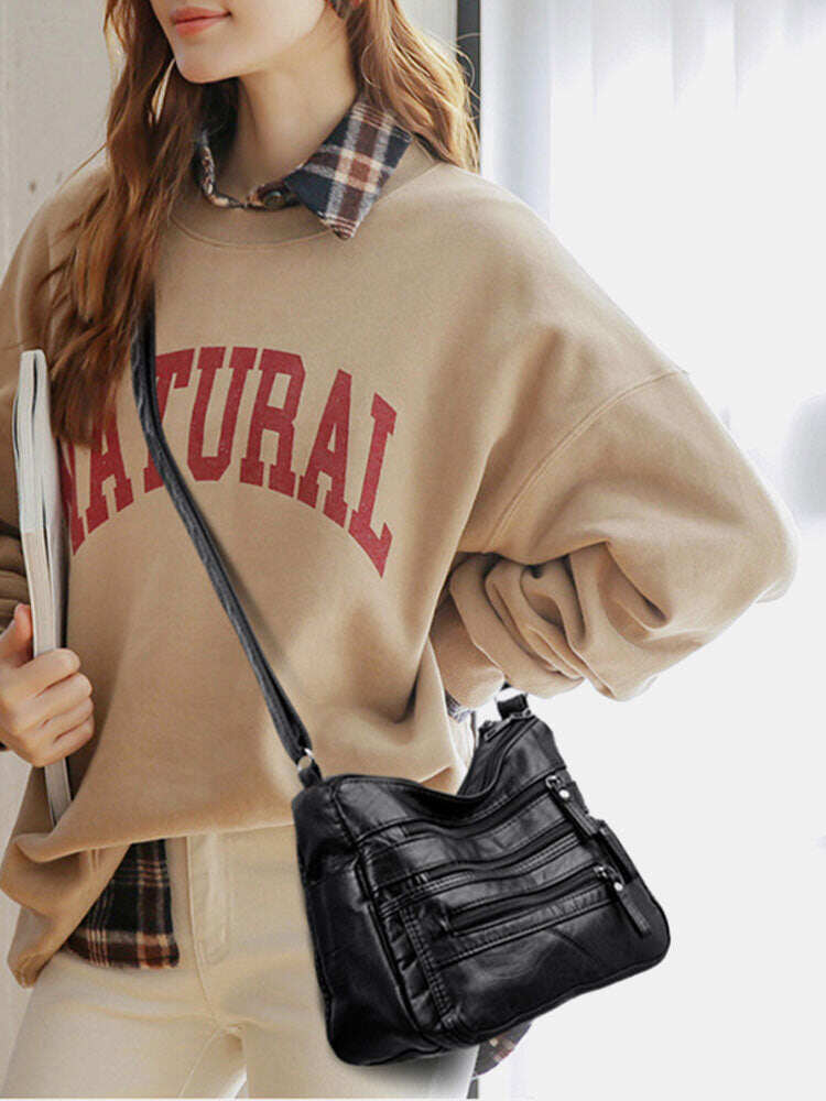 Bolsa de ombro feminina em couro PU com vários bolsos antirroubo