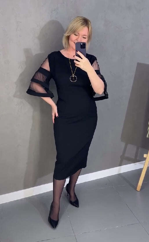 Elegantna haljina od tila koja se kopča patentnim zatvaračem