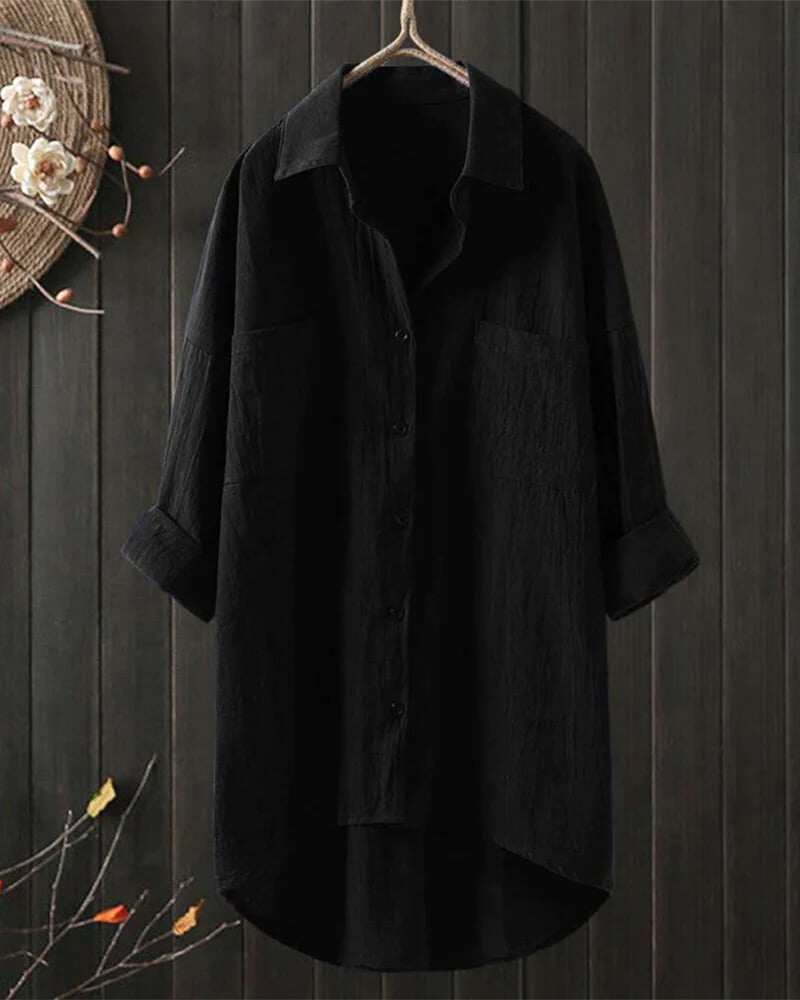 Blusa simples com mangas compridas em corte solto