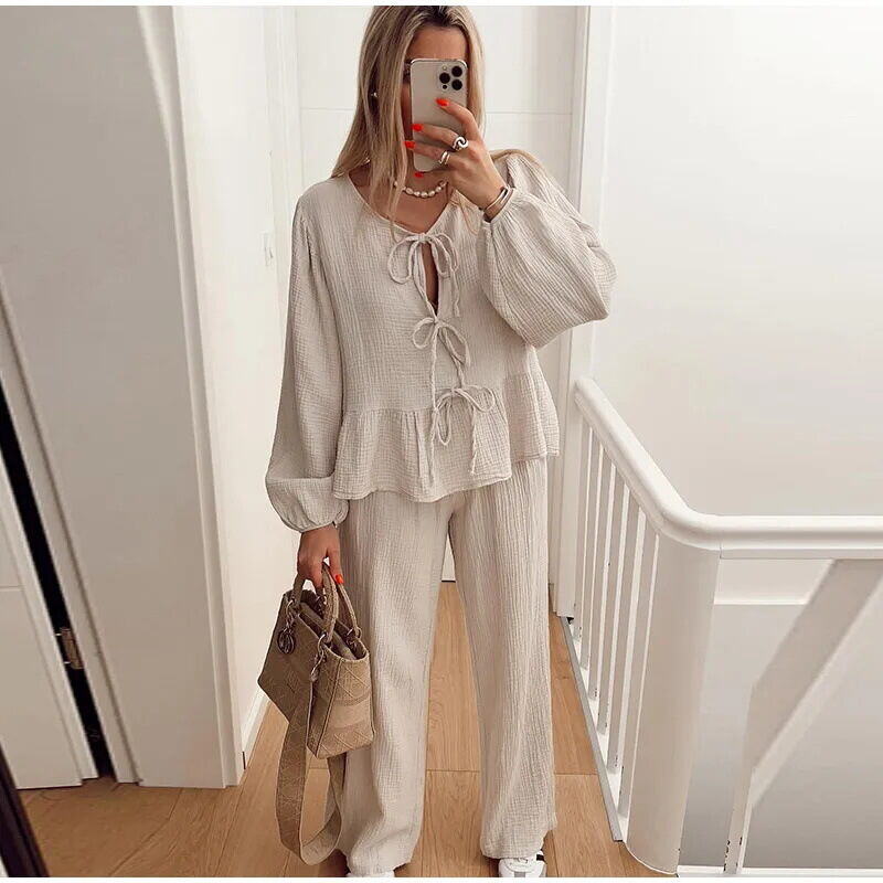 Conjunto de calças soltas de renda de moda casual, terno de calças com decote em O, camisa de cintura alta