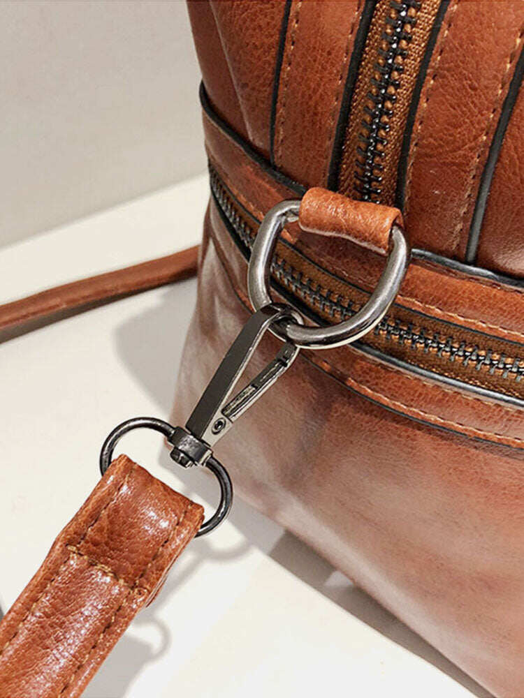 Bolsa feminina retrô rebitada Bolsa crossbody com grande capacidade