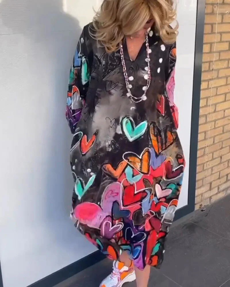 Long sleeve dress with heart print and V-neck