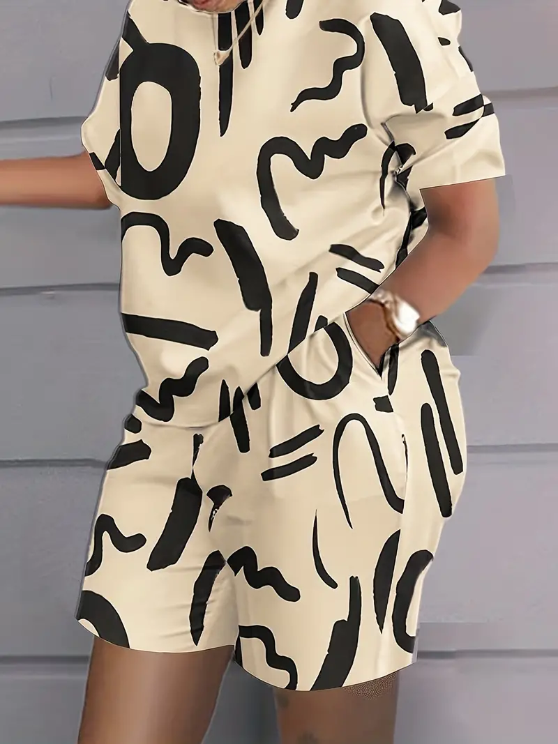 Conjunto casual de duas peças com estampa de letras laranja, gola redonda, manga curta