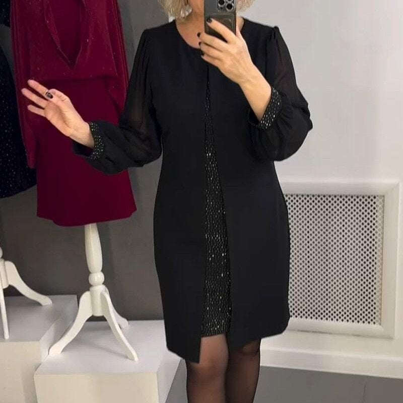 Czarna sukienka midi z ozdobą z kamieni szlachetnych
