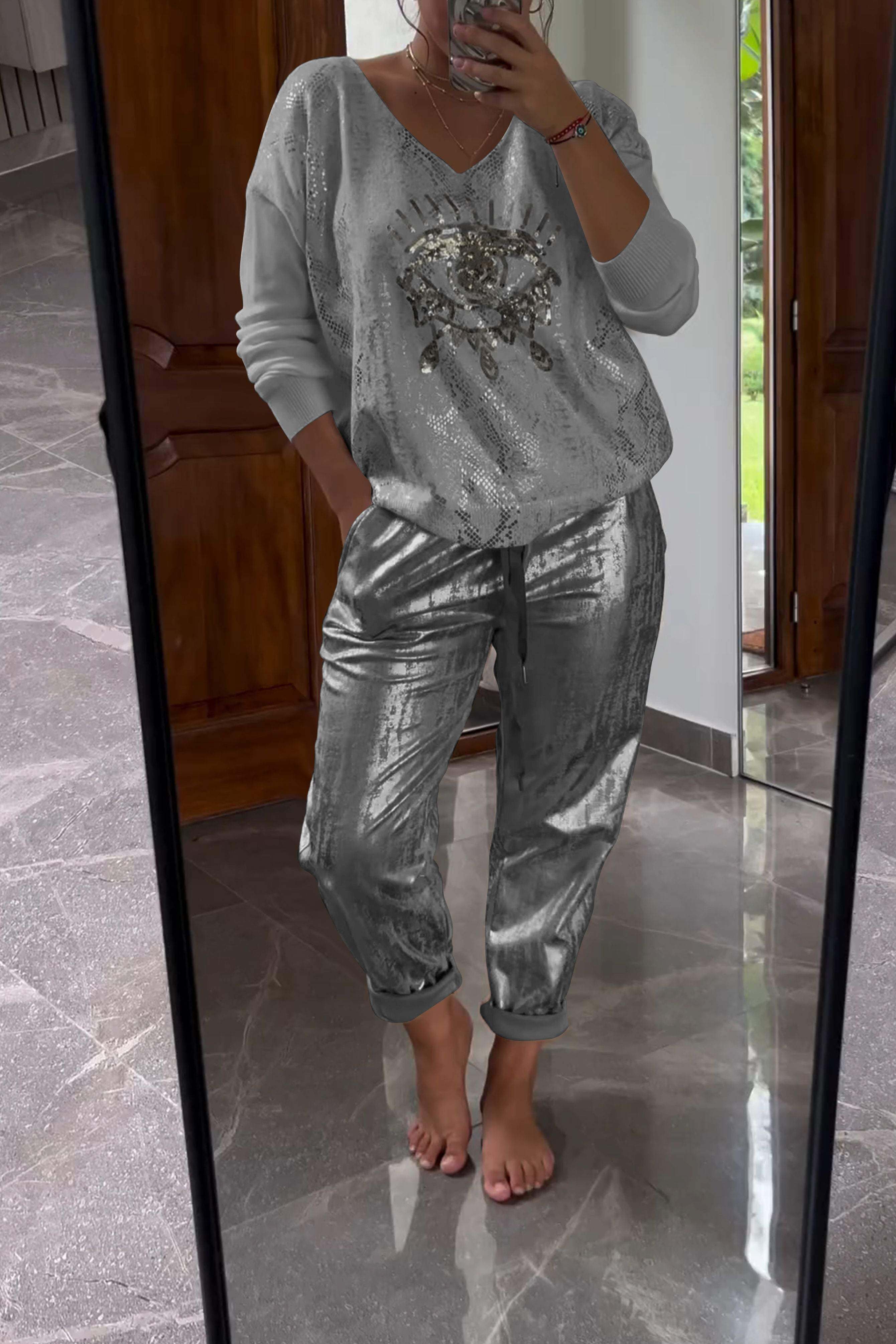 Conjunto de duas peças com top de lantejoulas e calça bronze da moda