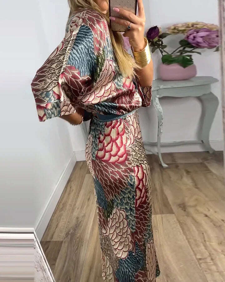 Conjunto elegante de blusa e saia com estampa de peixe e decote em V