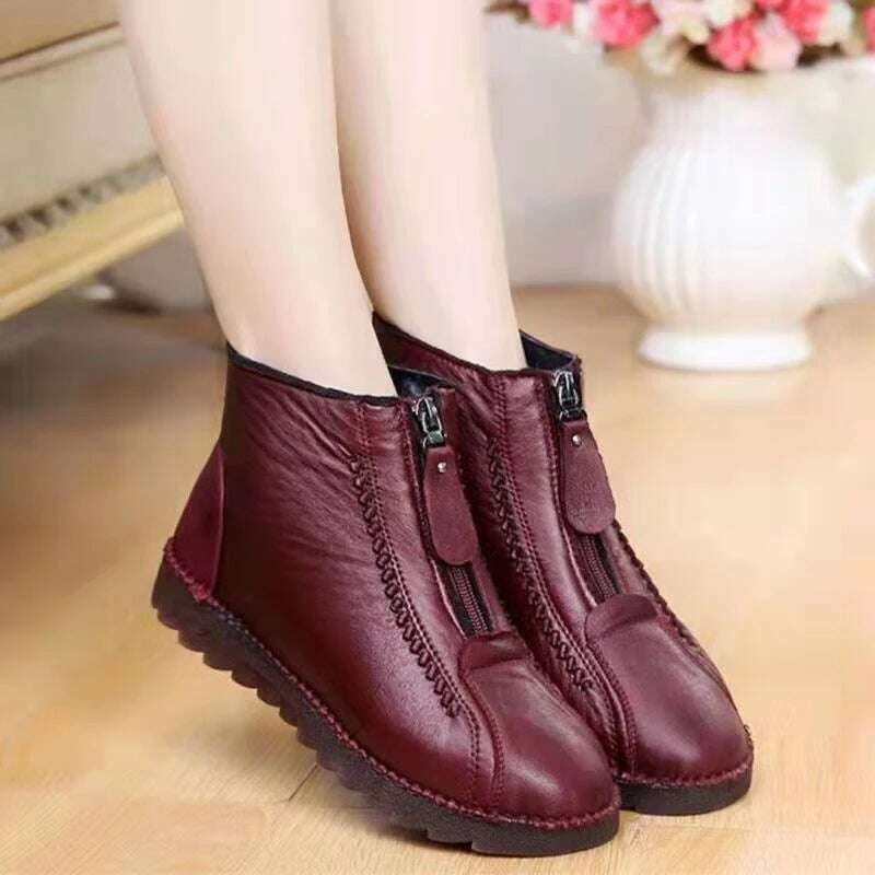 Botas femininas de inverno feitas de couro macio em estilo retrô