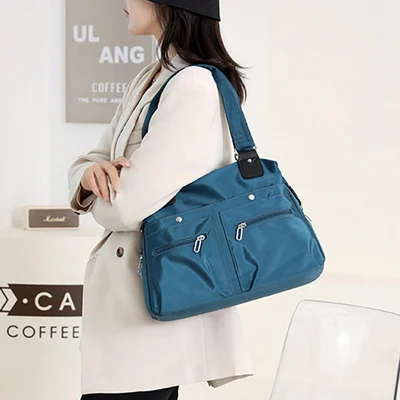 👜BOLSA DE OMBRO COM VÁRIOS BOLSOS E À PROVA D'ÁGUA DE GRANDE CAPACIDADE