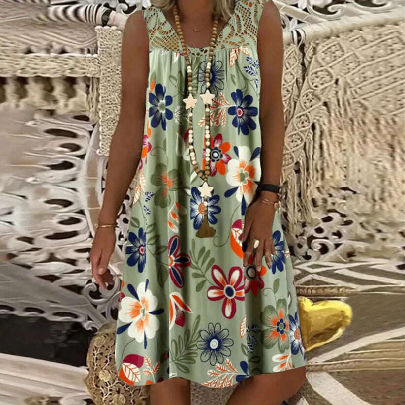 Šaty bez rukávů od kolen ke kolenům