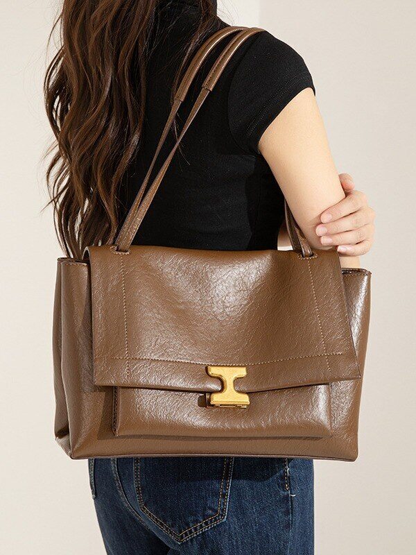 Új kézitáska: nagy kapacitású, vintage olajozott bőr stílus.