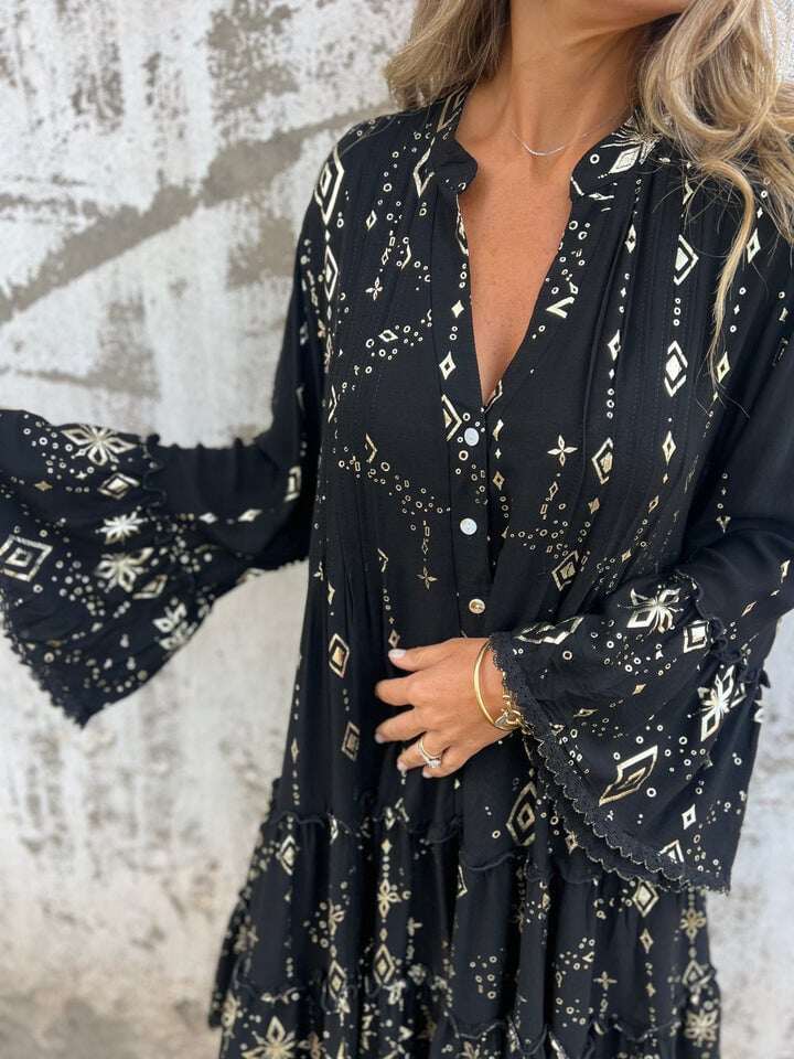 Venda imperdível 🔥 Vestido confortável com estampa elástica e decote em V
