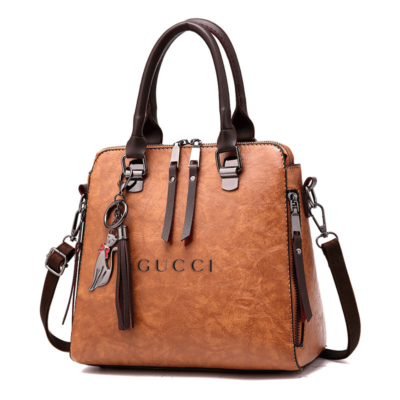 Torebka damska GUCCI w stylu retro o dużej pojemności. Listonoszka na ramię