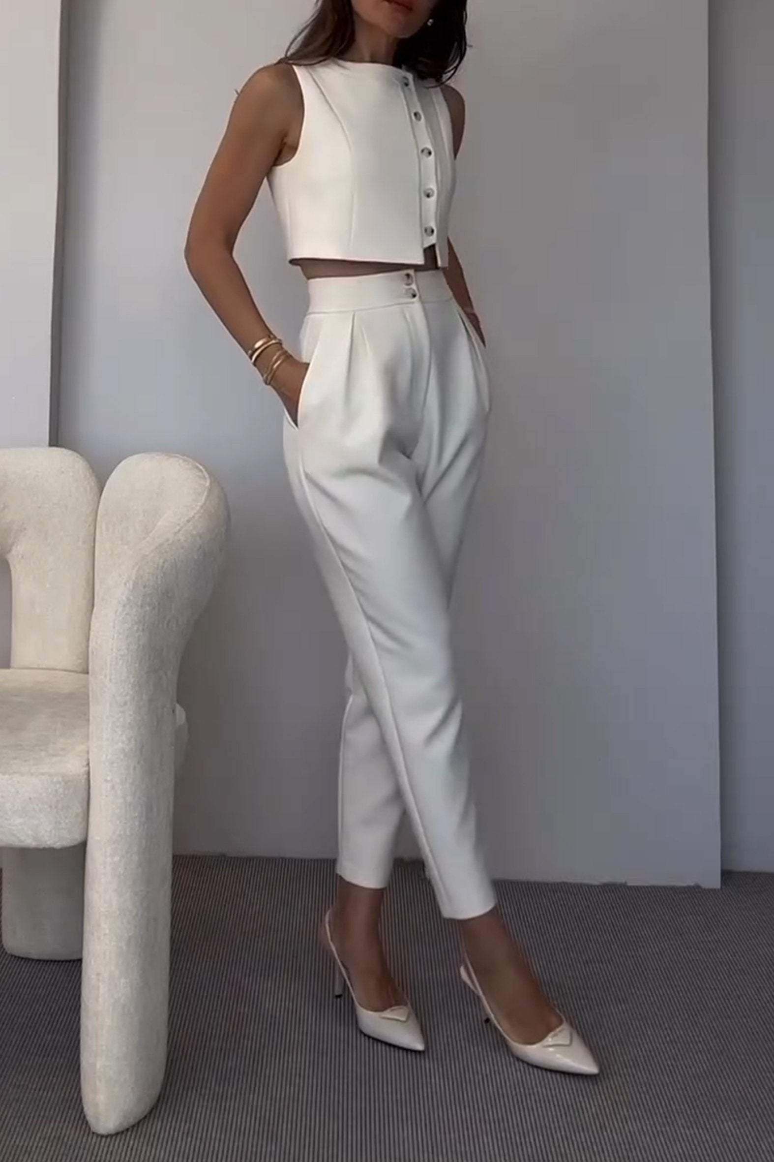 Conjunto de duas peças com top e calça com zíper