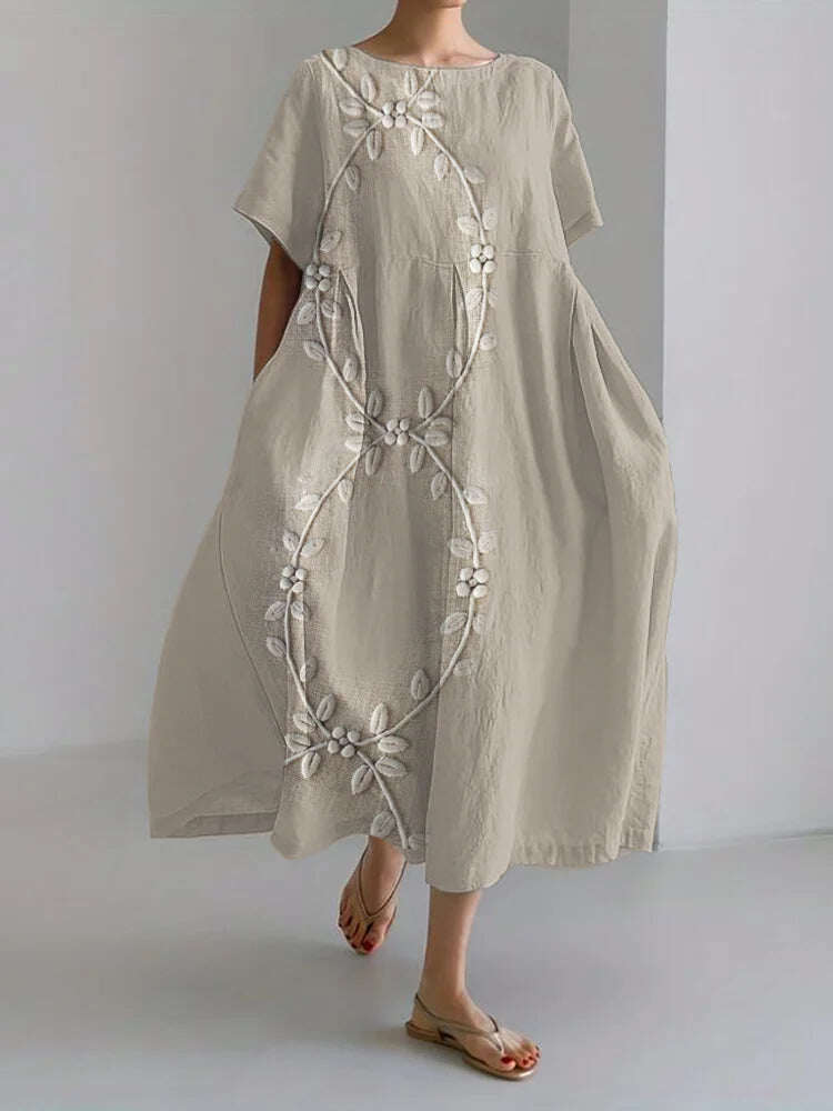 Elegante vestido longo em mistura de linho e bordado com videiras