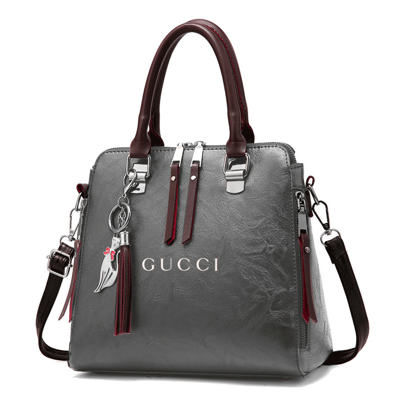 Torebka damska GUCCI w stylu retro o dużej pojemności. Listonoszka na ramię