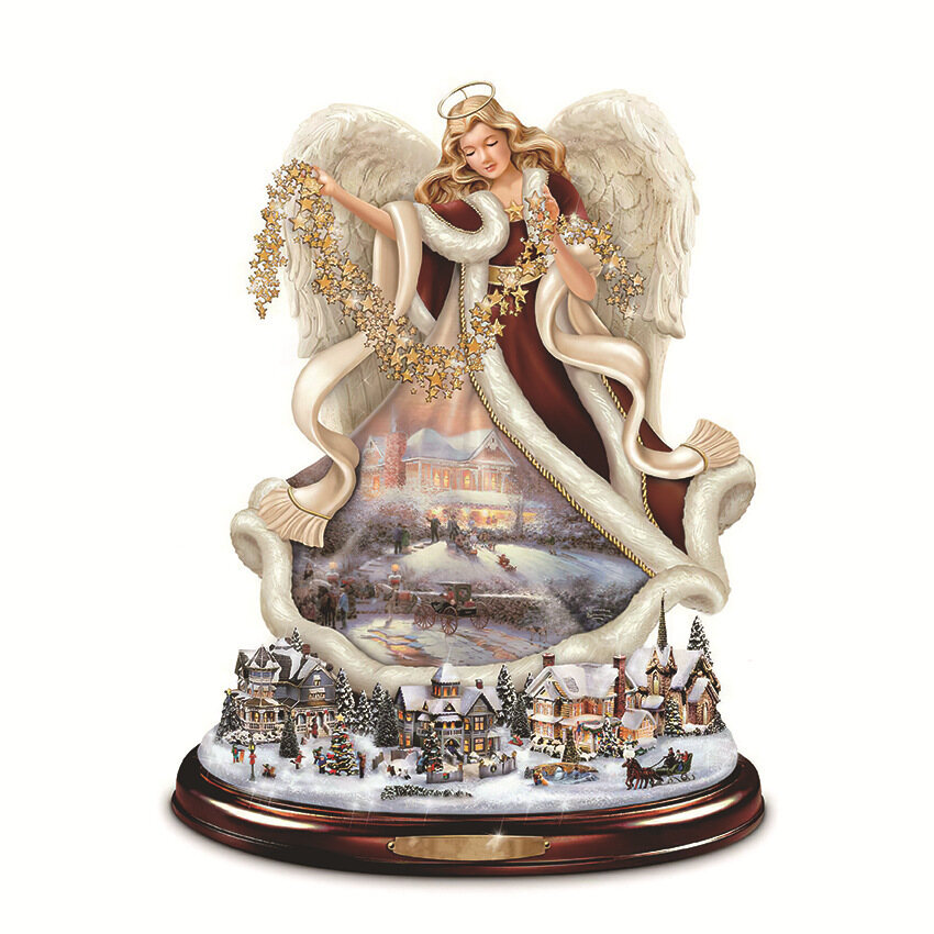 UMA ÁRVORE COM LUZES, UM TREM EM MOVIMENTO, ADESIVOS COM CLIMA MUSICAL