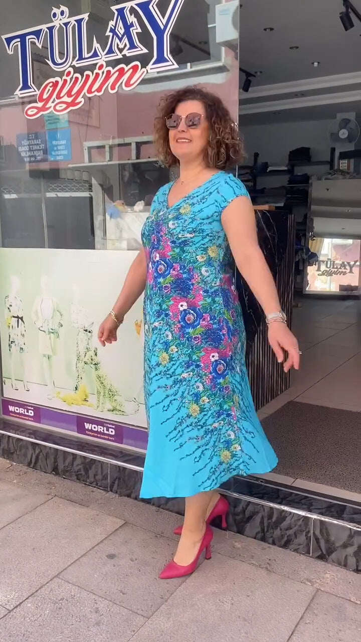Vestido estampado com decote em V 2025