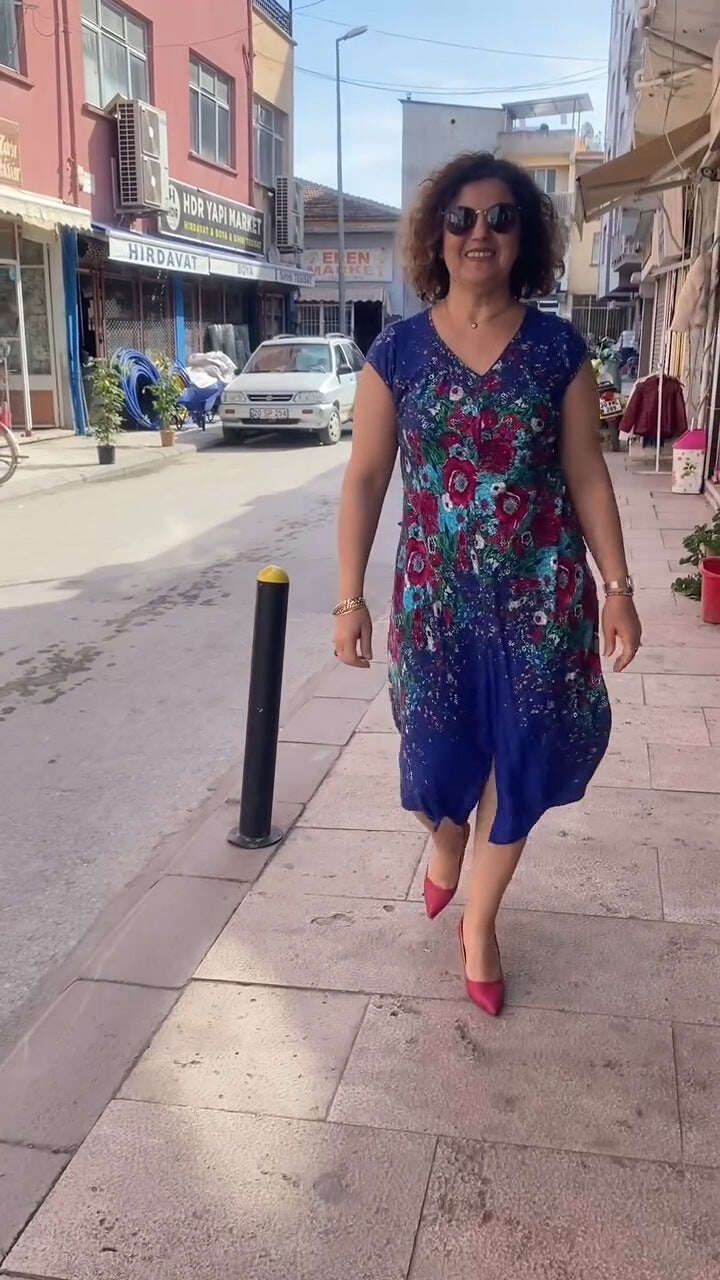 Vestido estampado com decote em V 2025
