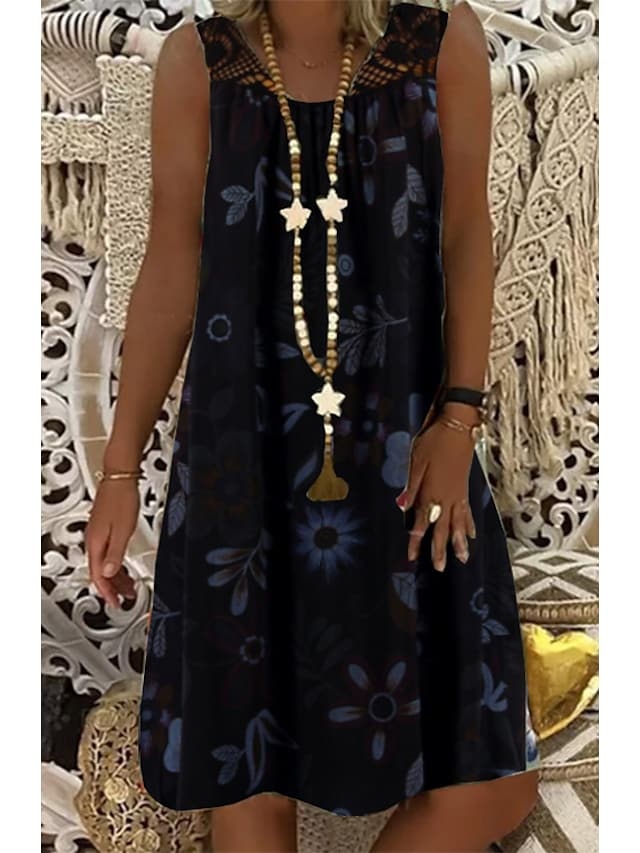 Šaty bez rukávů od kolen ke kolenům