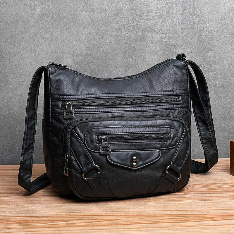 Bolsa de ombro feminina feita de couro macio