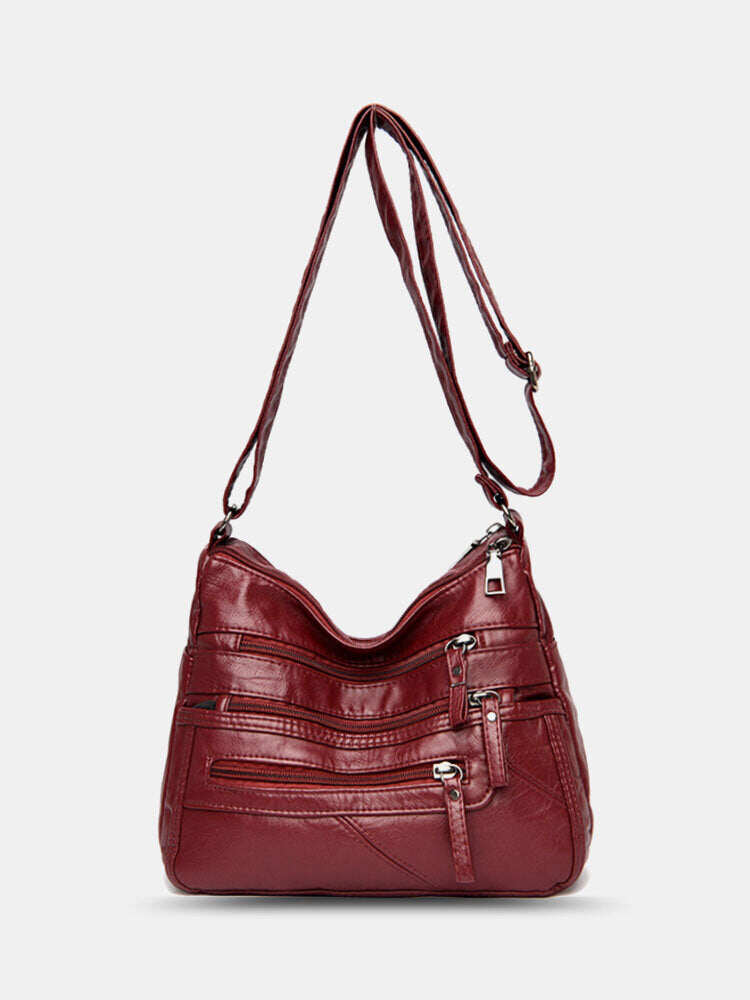 Bolsa de ombro feminina em couro PU com vários bolsos antirroubo