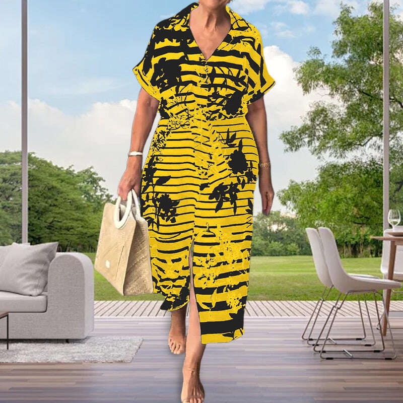 Рокля с къс ръкав с флорален принт и цепка в долната част