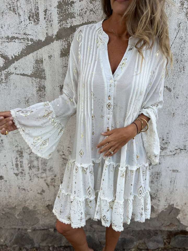 Venda imperdível 🔥 Vestido confortável com estampa elástica e decote em V