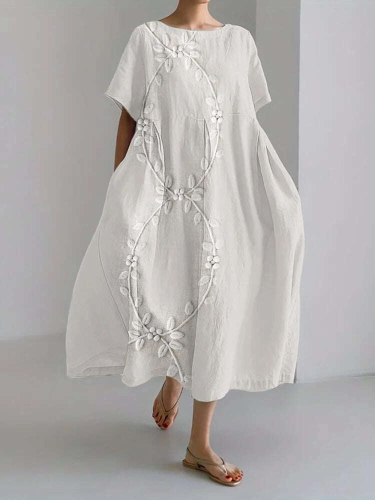 Elegante vestido longo em mistura de linho e bordado com videiras