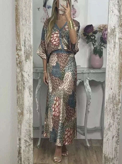 Conjunto elegante de blusa e saia com estampa de peixe e decote em V