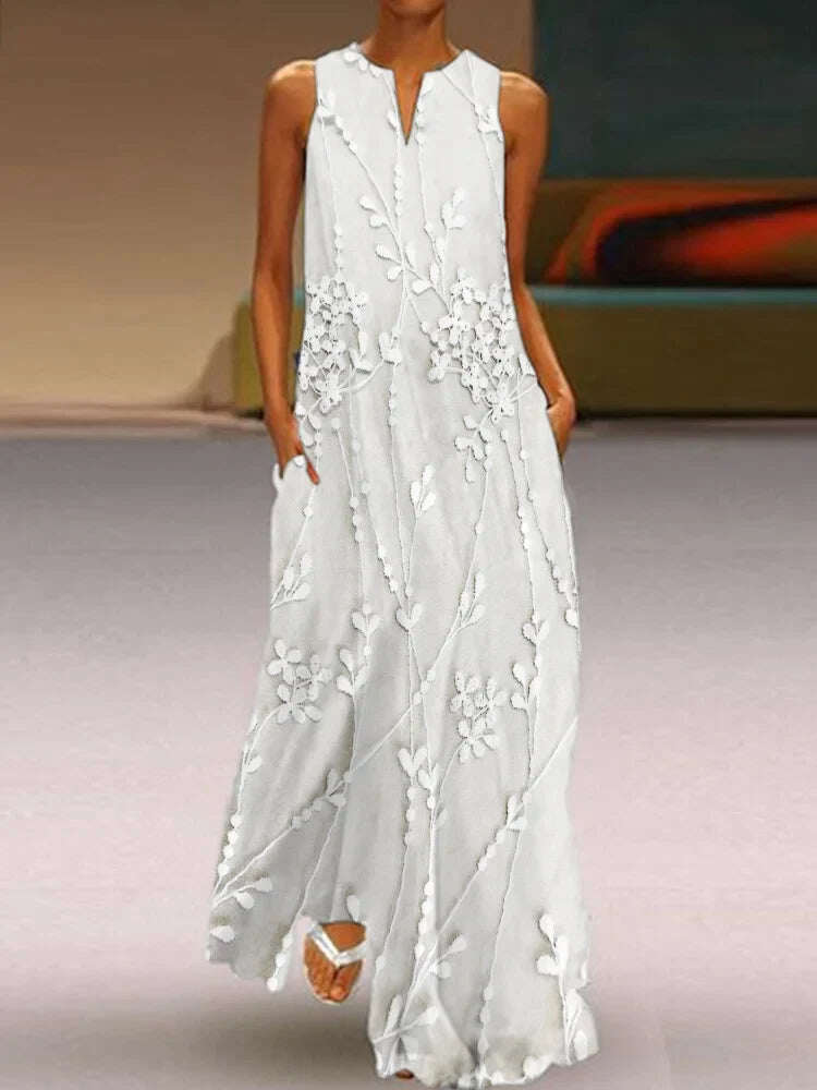 Vestido comprido elegante e fluído com renda bordada com flores