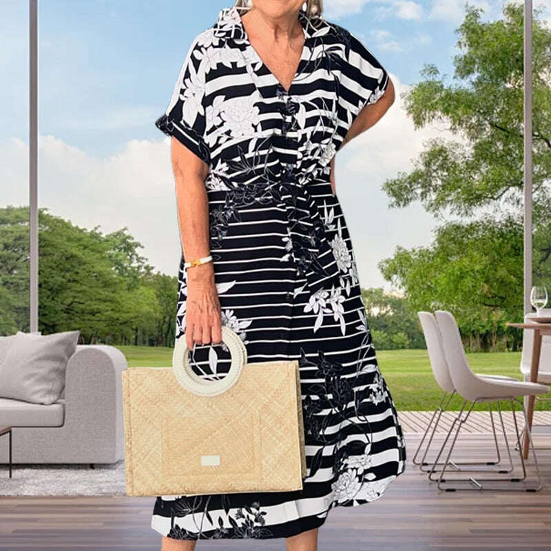 Рокля с къс ръкав с флорален принт и цепка в долната част