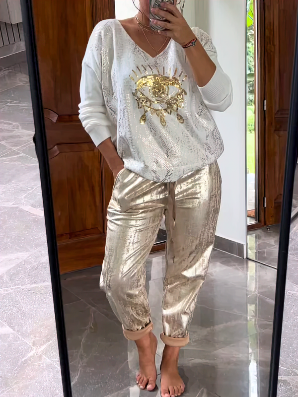 Conjunto de duas peças com top de lantejoulas e calça bronze da moda