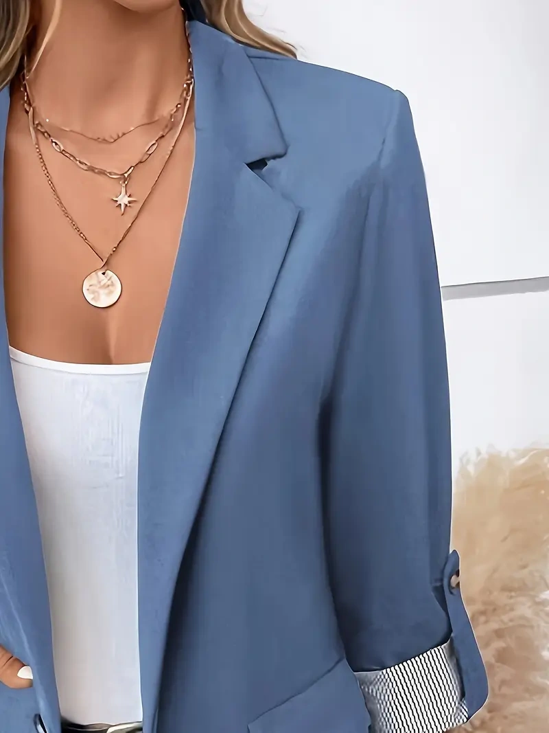 Jaqueta elegante – Gola, botões, mangas compridas, perfeita para o escritório.