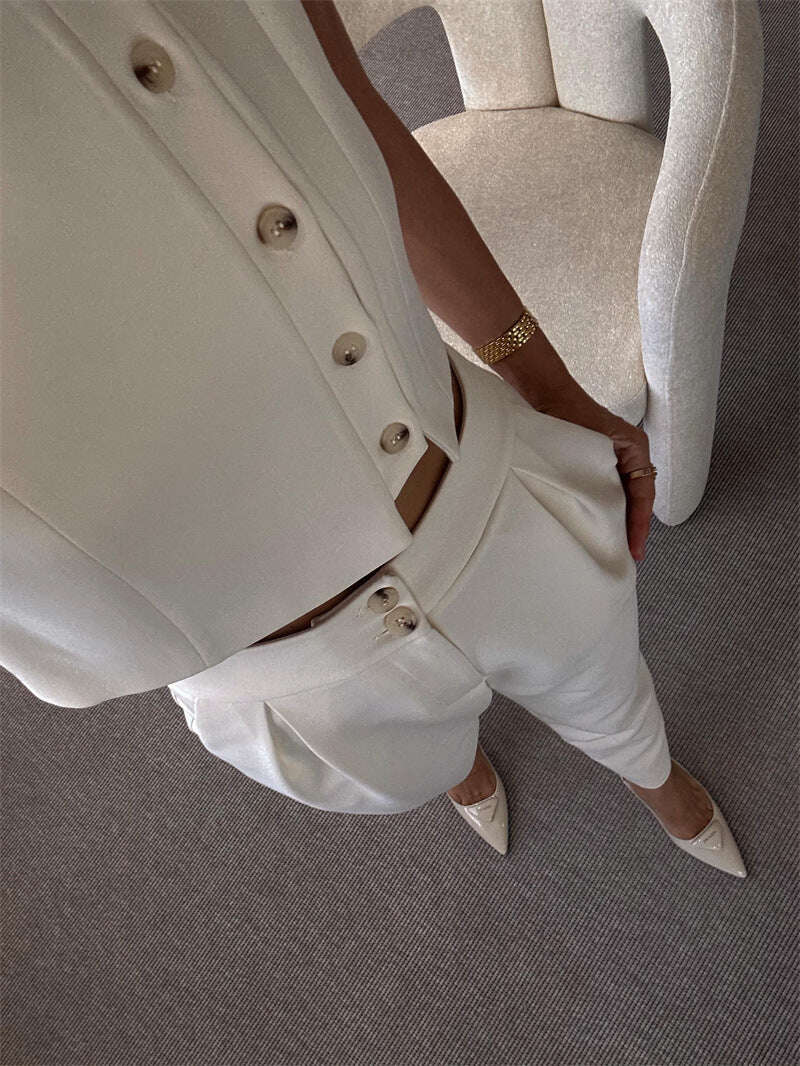 Conjunto de duas peças com top e calça com zíper